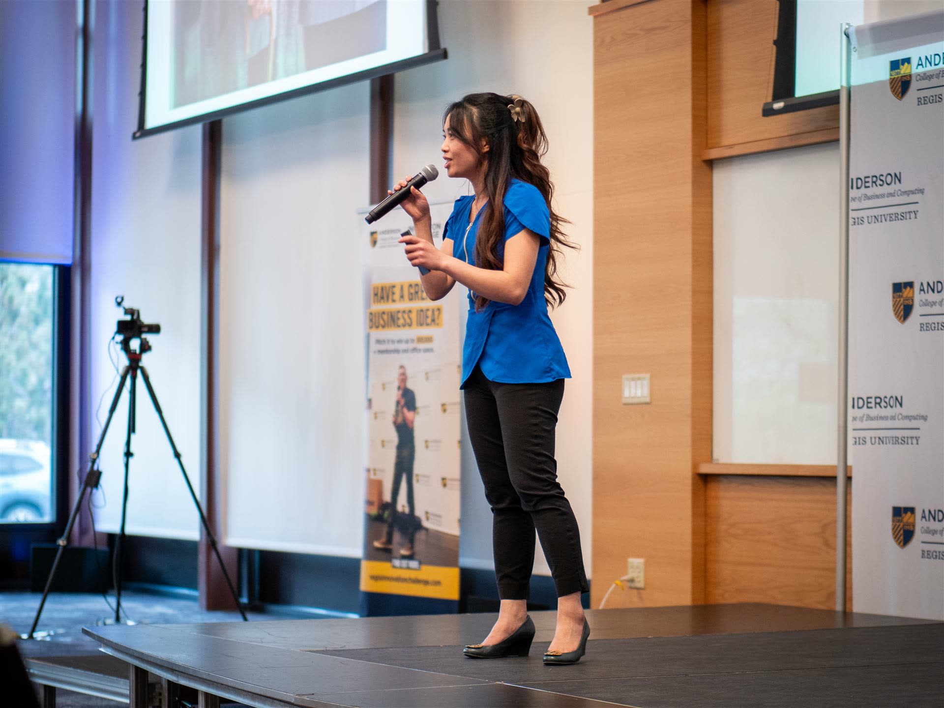 A Regis student presents their venture at an Innovation Challenge pitch