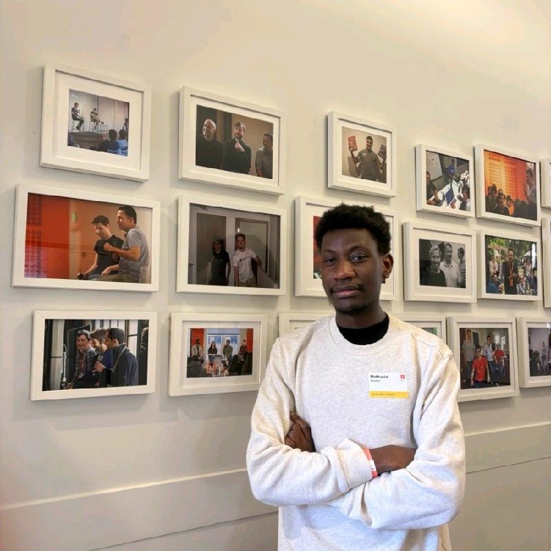 Regis student Nathaniel Wankio at the Y Combinator × AgentPhone hackathon